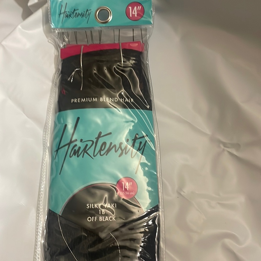 New in package 14 inch Hair Tensity hair extensions. Premium blend hair.
